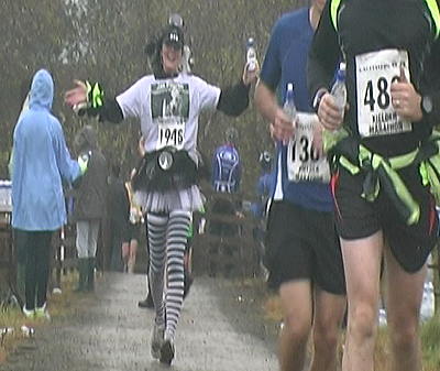 Jan Pilgrim raining money for us at the Kielder Marathon